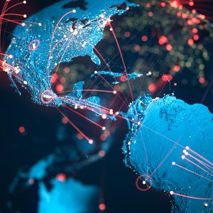 Pictorial representation of F5 data theft incident. Digital illustration of a 3D globe showing network connections and data flow across continents, highlighted with red lines and glowing points, representing global communication and connectivity.
