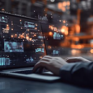 Pictorial representation of a laptop with various charts and graphs illuminated on the screen.