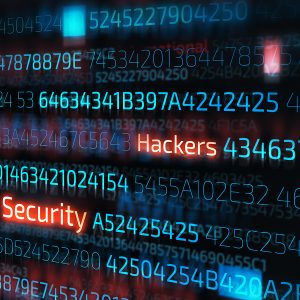 Pictorial representation of TeamPCP. Glowing code on a screen where several word such as Crime, Hackers, and Security are highlighted in a contrasting color.